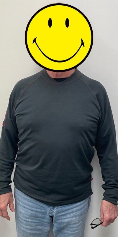 A man with a smiley face on his face.