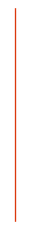 A red pencil is sitting on a white surface.