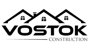 A black and white logo for a construction company called vostok construction.