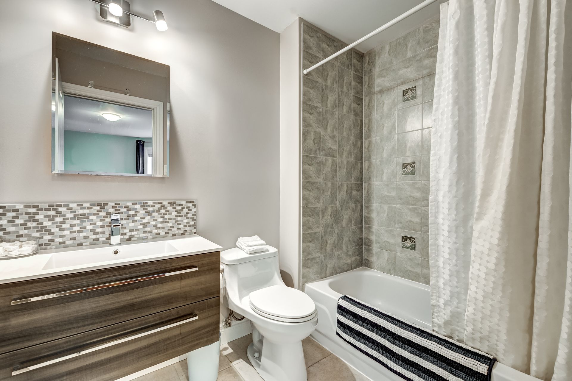 A beautiful bathroom with shower-tub combo