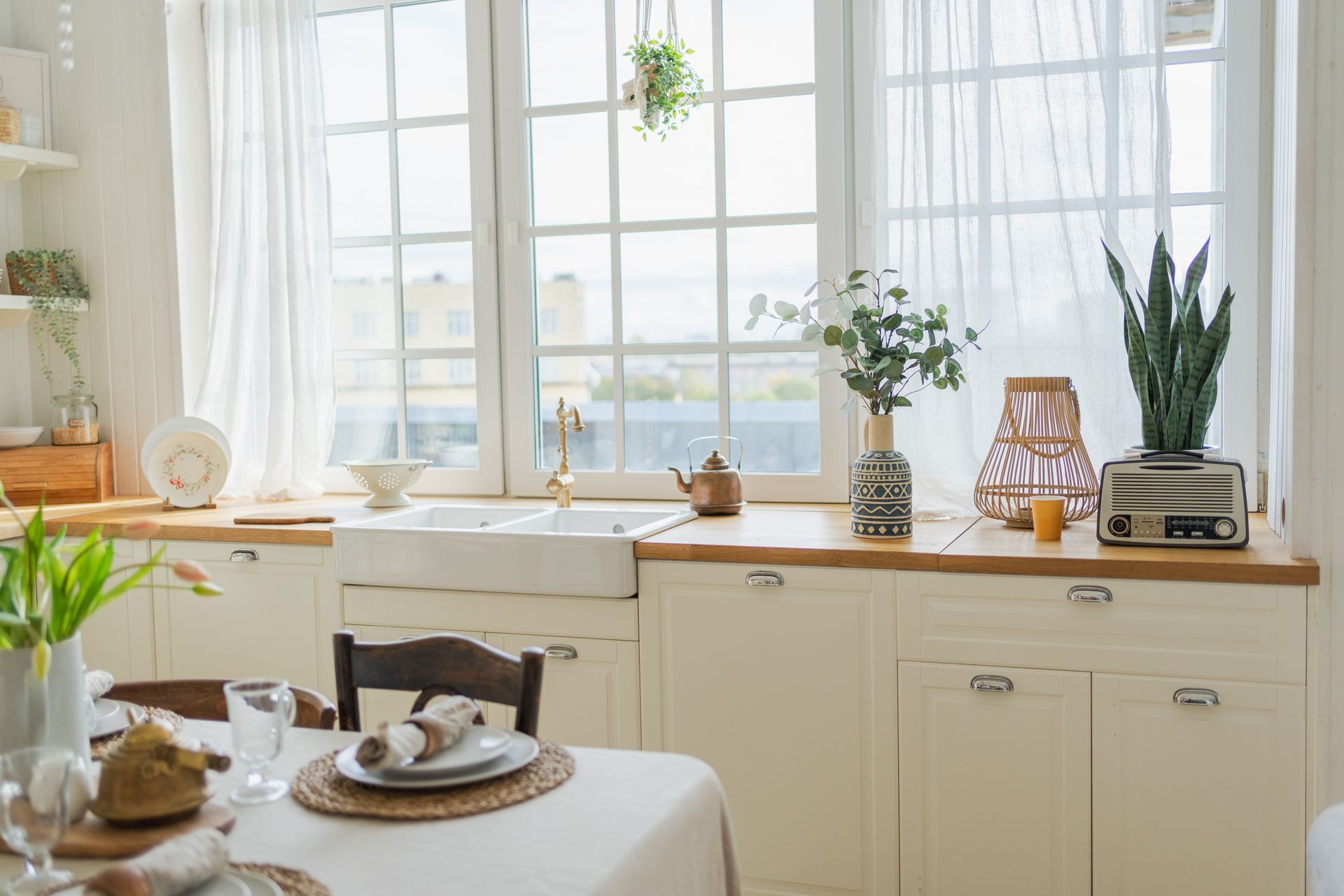 A beautiful kitchen with light coming through the windows