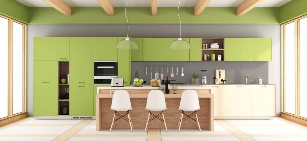 A Modern Kitchen With Green Cabinets And A Wooden Ceiling — South East Kitchens In Burleigh Heads, QLD