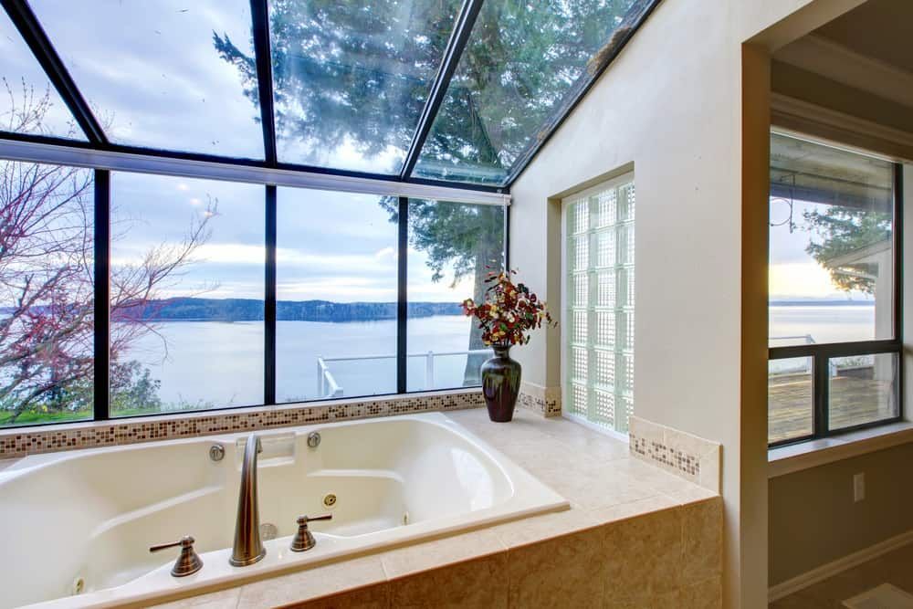 A Bathroom With A Jacuzzi Tub And A View Of The Ocean — South East Kitchens In Gold Coast, QLD