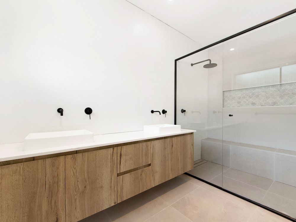 A Bathroom With Two Sinks And A Walk In Shower — South East Kitchens In Gold Coast, QLD