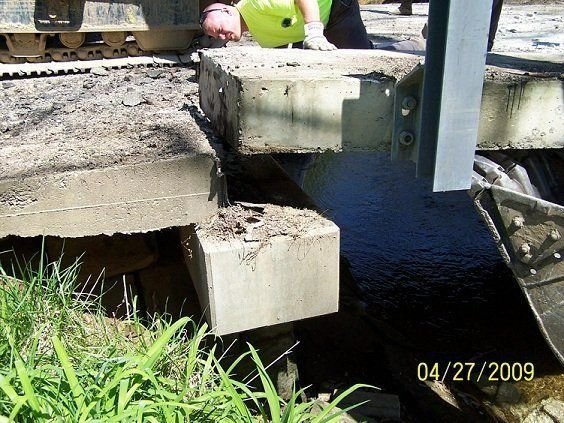 A man is working on a bridge on 04/27/2009