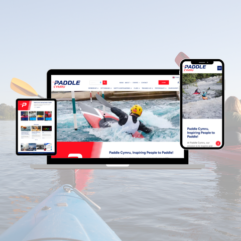 Desktop, laptop, tablet, and phone displaying a responsive website with colorful app icons