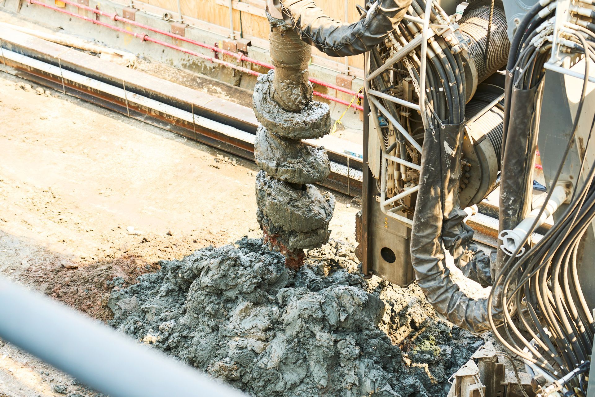 A machine is digging a hole in the ground. A machine is digging a hole in the ground.