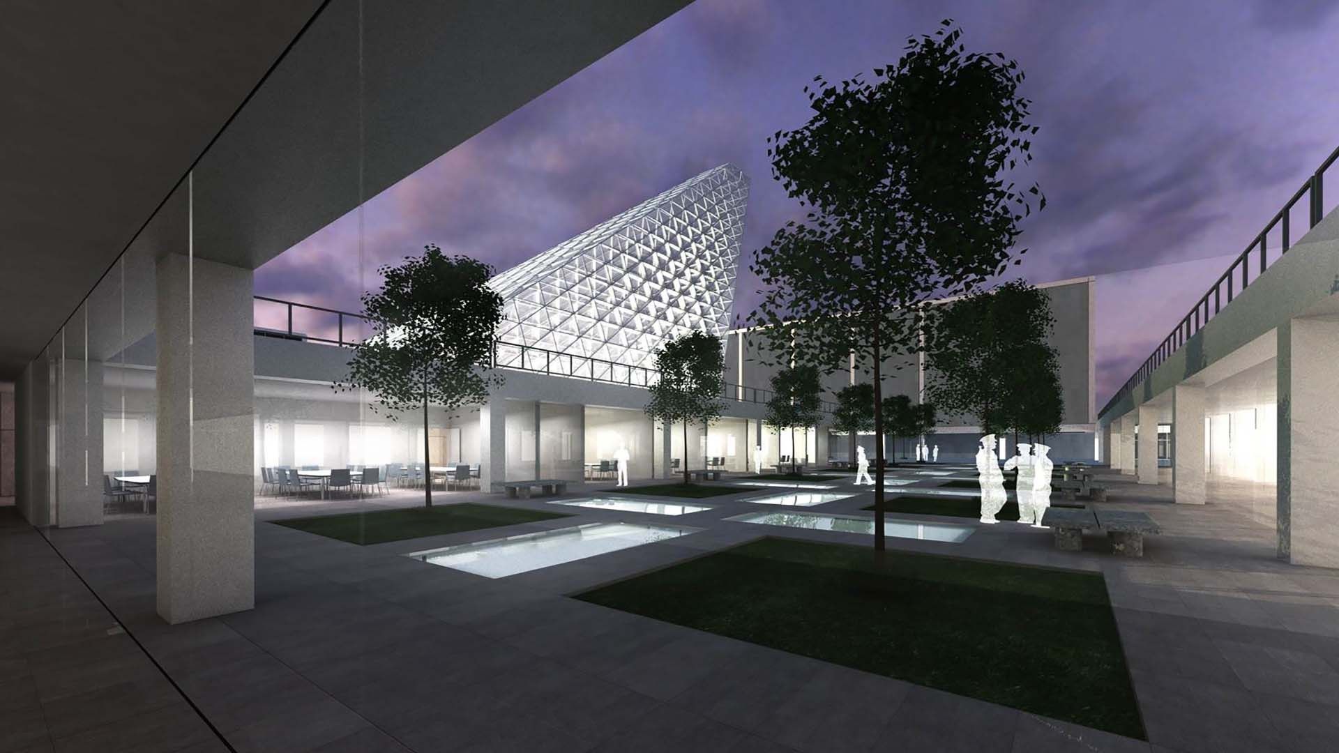 Modern courtyard at dusk with illuminated building, trees, and a few people walking beneath an overhang