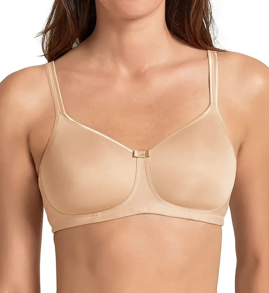 A beige bra on a person's upper body; the bra has adjustable straps and a small detail at the center.