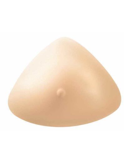 Breast prosthesis in a triangle shape, beige color.