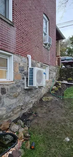 Brick home with air conditioning unit for HVAC and AC repair services