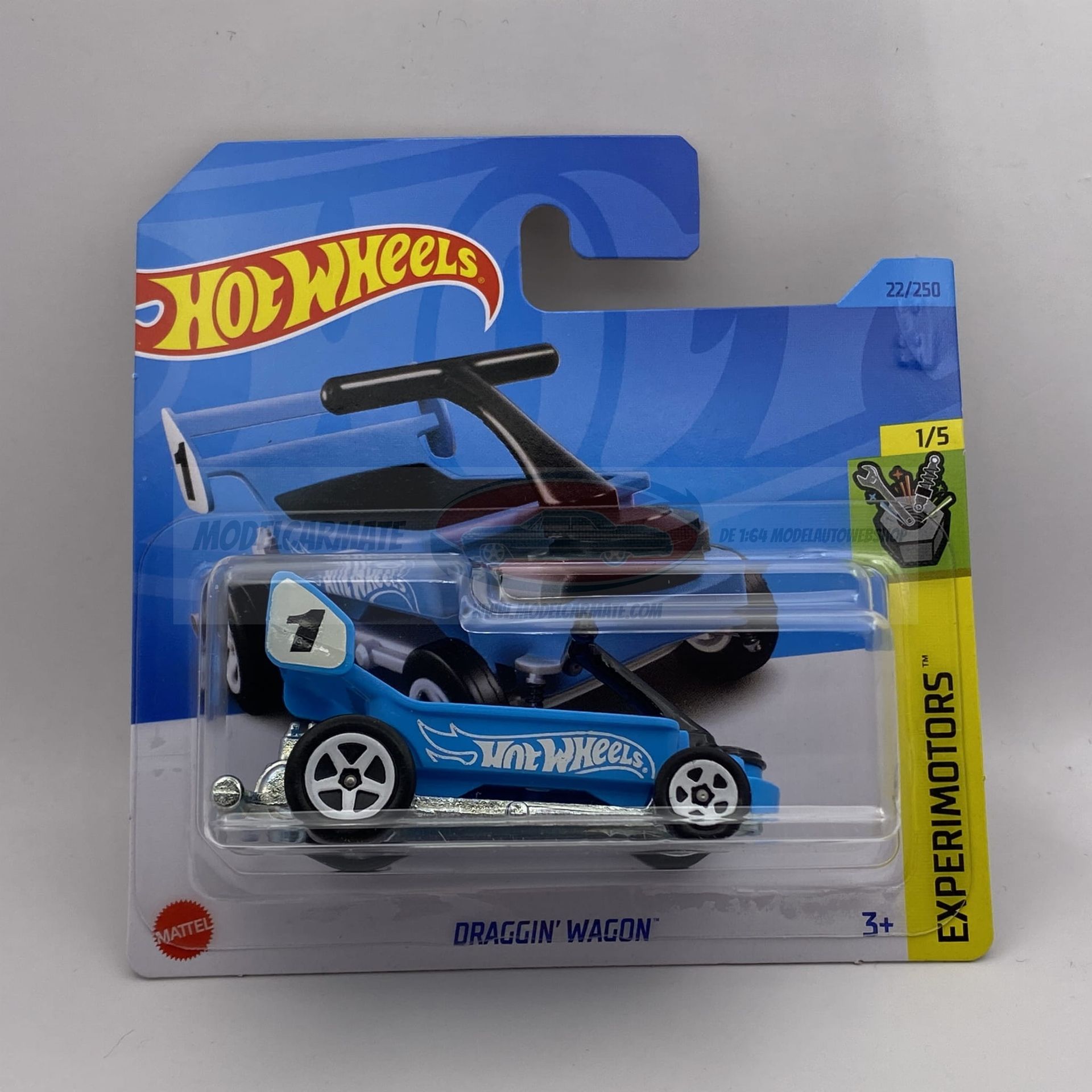 Hot Wheels Draggin' Wagon speelgoedauto in blauwe verpakking.