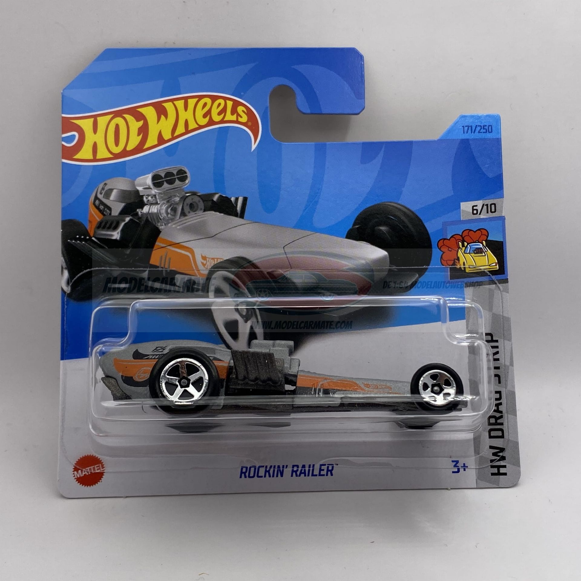 Hot Wheels auto in verpakking, zilver met oranje accenten, "Rockin' Railer".