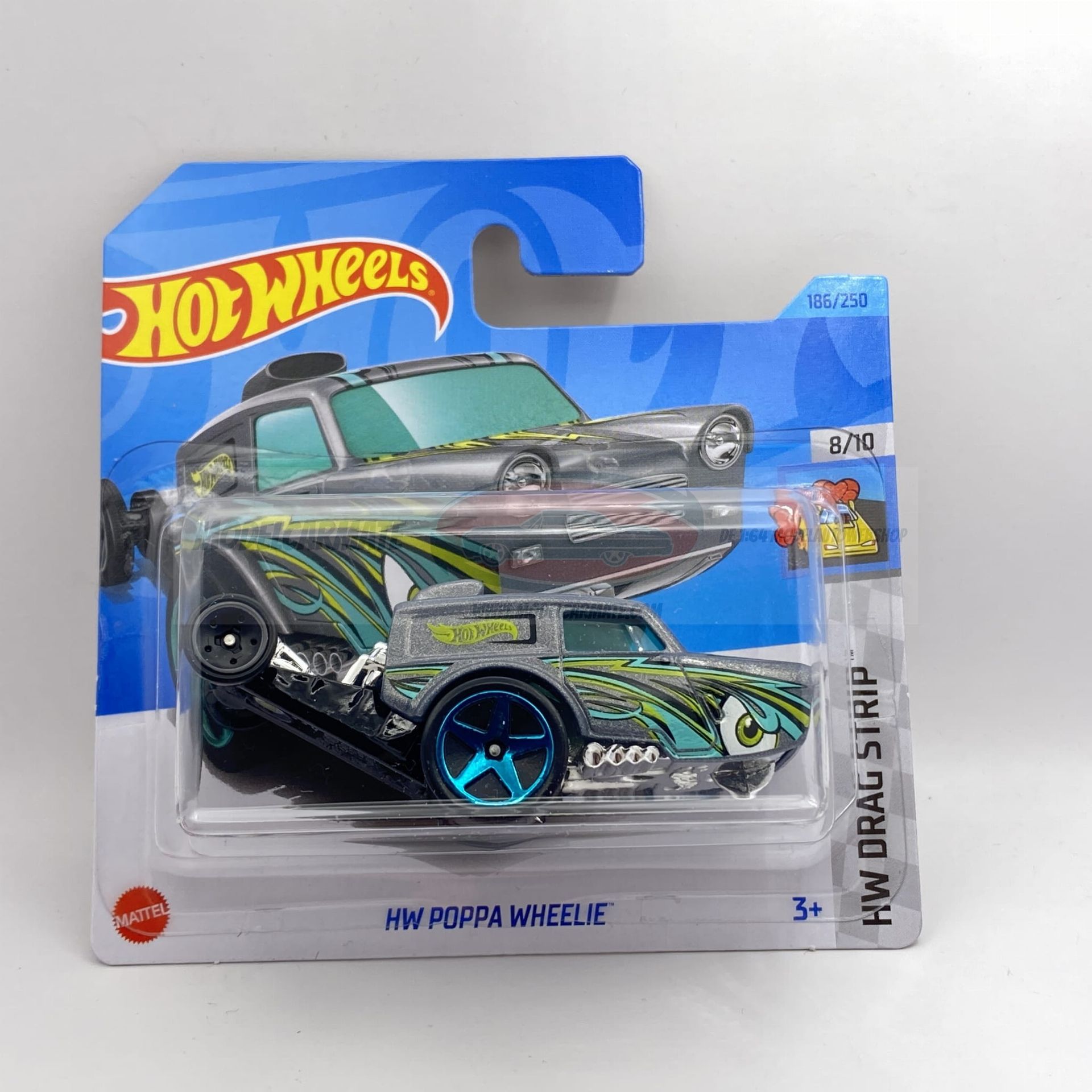 Hot Wheels speelgoedauto in verpakking, zilver met blauwe wielen, "HW DRAG STRIP".