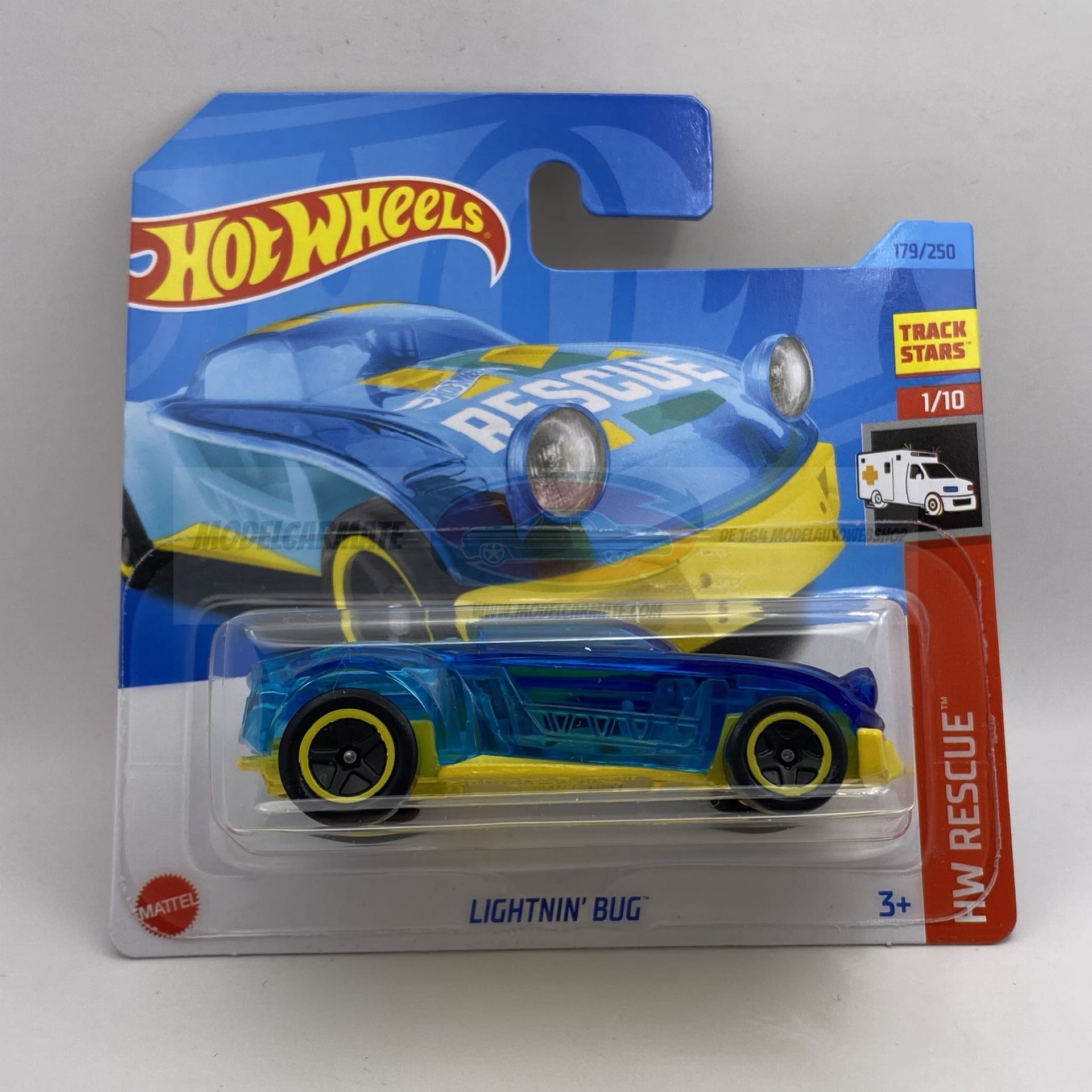 Blauwe en gele Hot Wheels "Lightnin' Bug" auto in verpakking, "HW Rescue" serie.