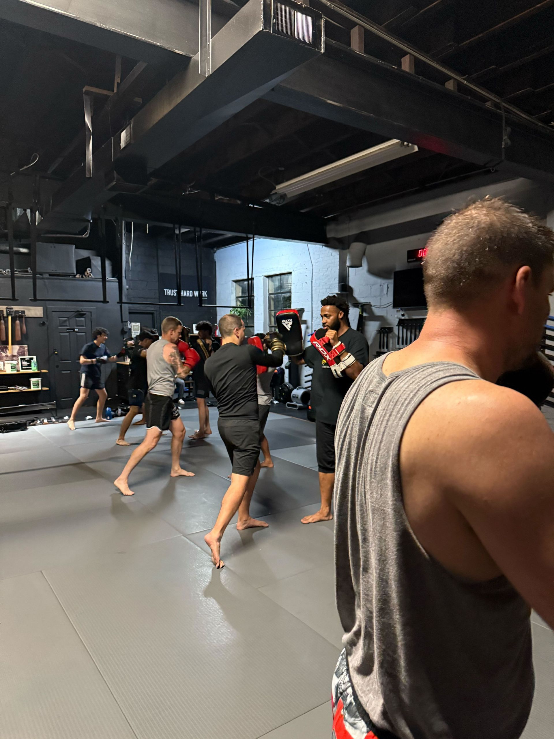 Adults practice No-Gi grappling at Bodega Jiu-Jitsu in Maplewood, NJ, building confidence and community.