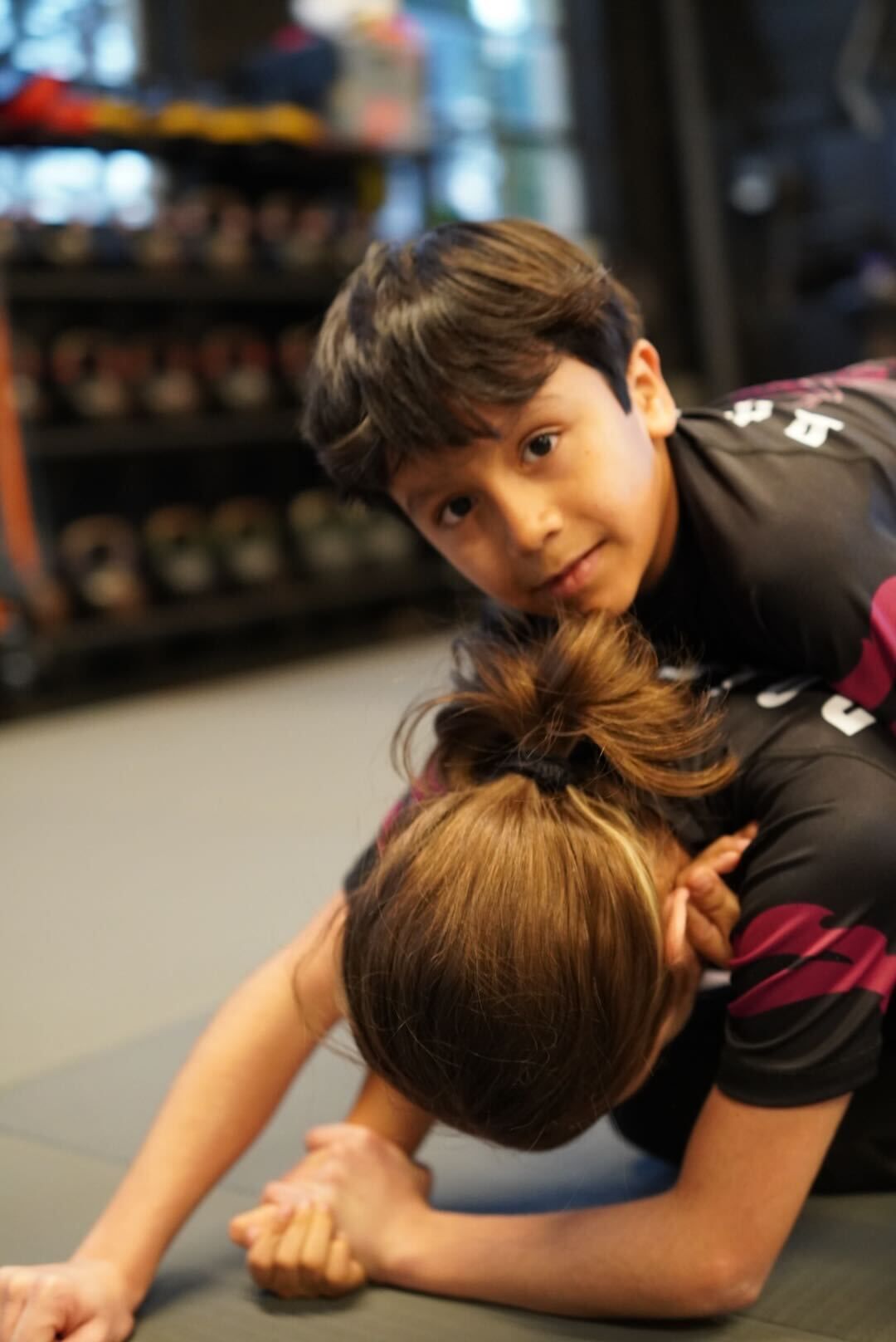 Kids practice controlled grappling drills at Bodega Jiu-Jitsu in Maplewood, NJ to build focus.