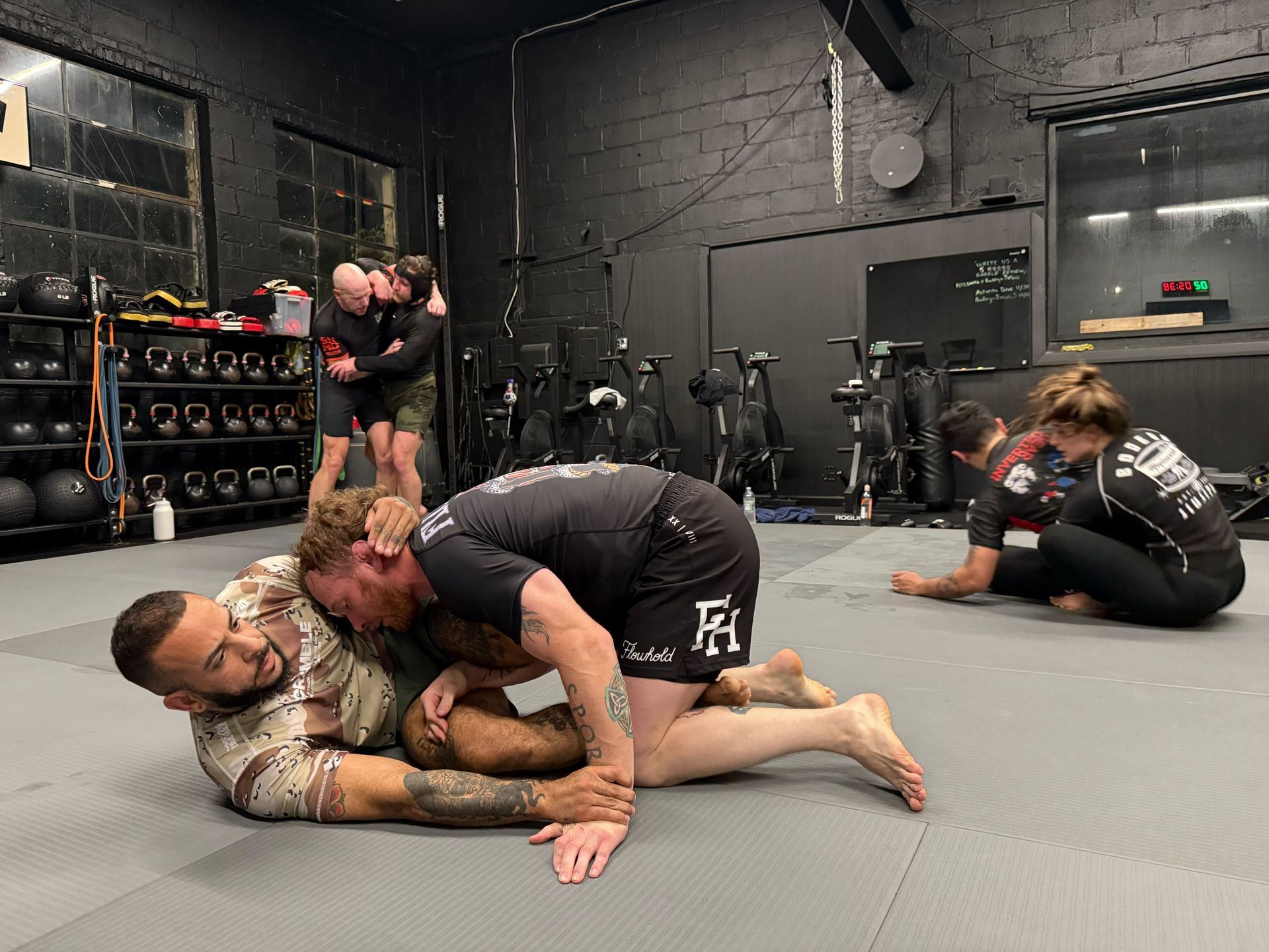 Adults train grappling drills at Bodega Jiu-Jitsu in Maplewood, NJ, building cardio, strength, and confidence.