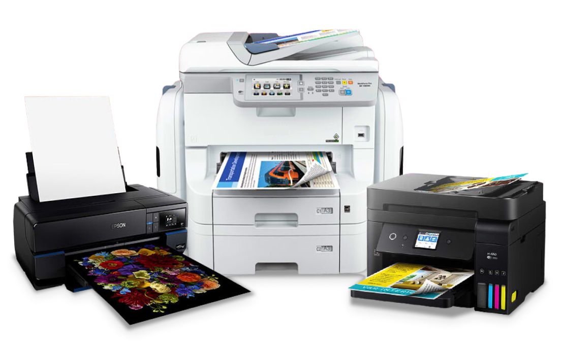 Three printers with printed color documents and a sheet of blank paper.