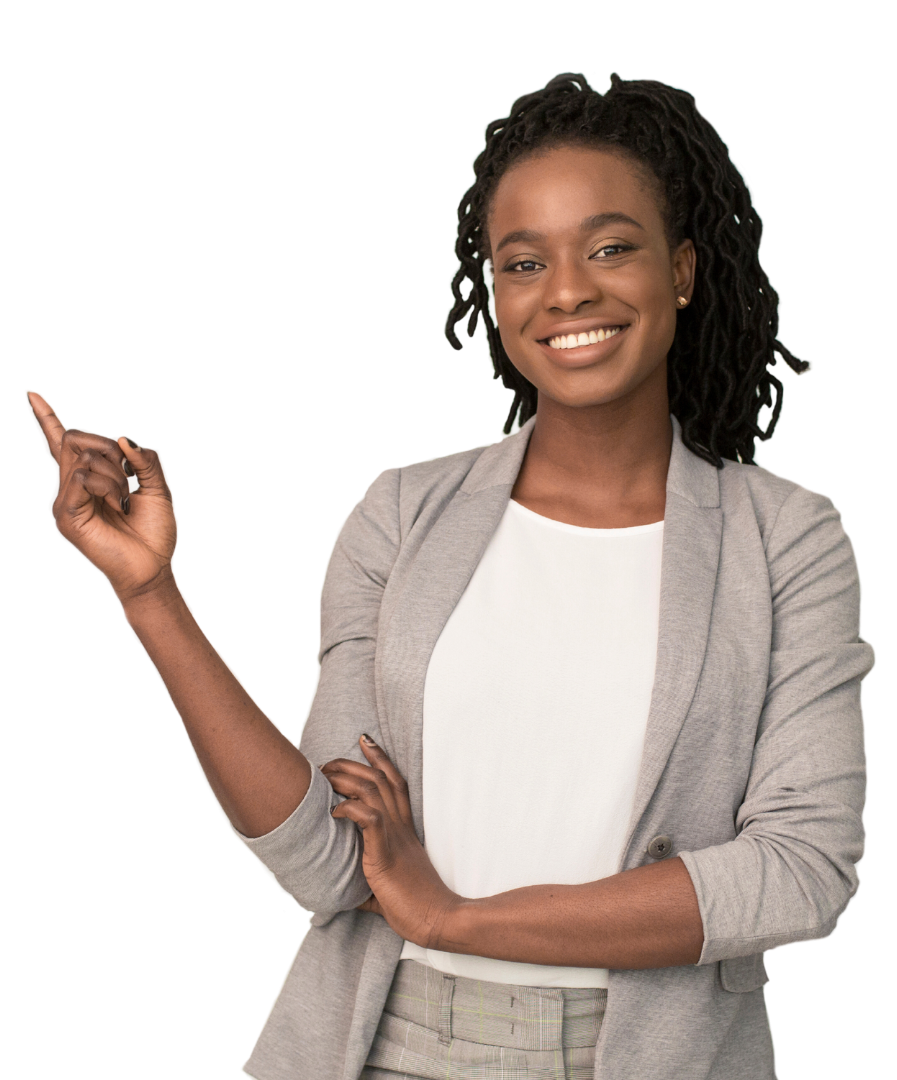 Woman pointing upwards, smiling, wearing a light gray blazer and white shirt.