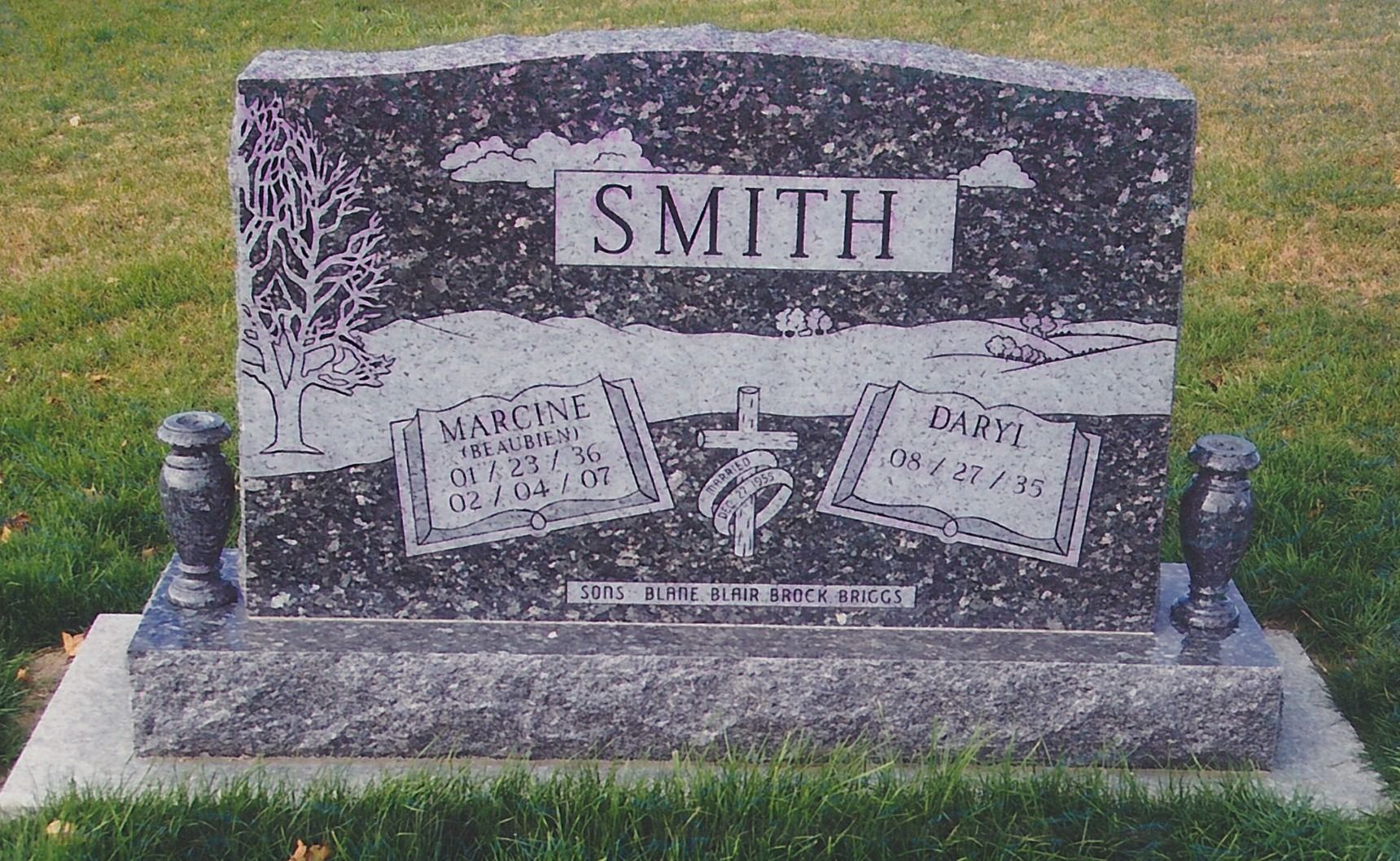 Smith family gravestone with engraved plaques and floral design in a cemetery