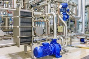 There is a Blue Pump in the Middle of a Factory — FNQ Hot Water In Mareeba, QLD
