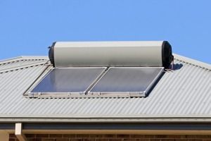 A Solar Water Heater is on the Roof of a House — FNQ Hot Water In Port Douglas, QLD