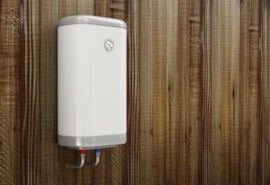 A White Water Heater is Hanging on a Wooden Wall — FNQ Hot Water In Cairns, QLD
