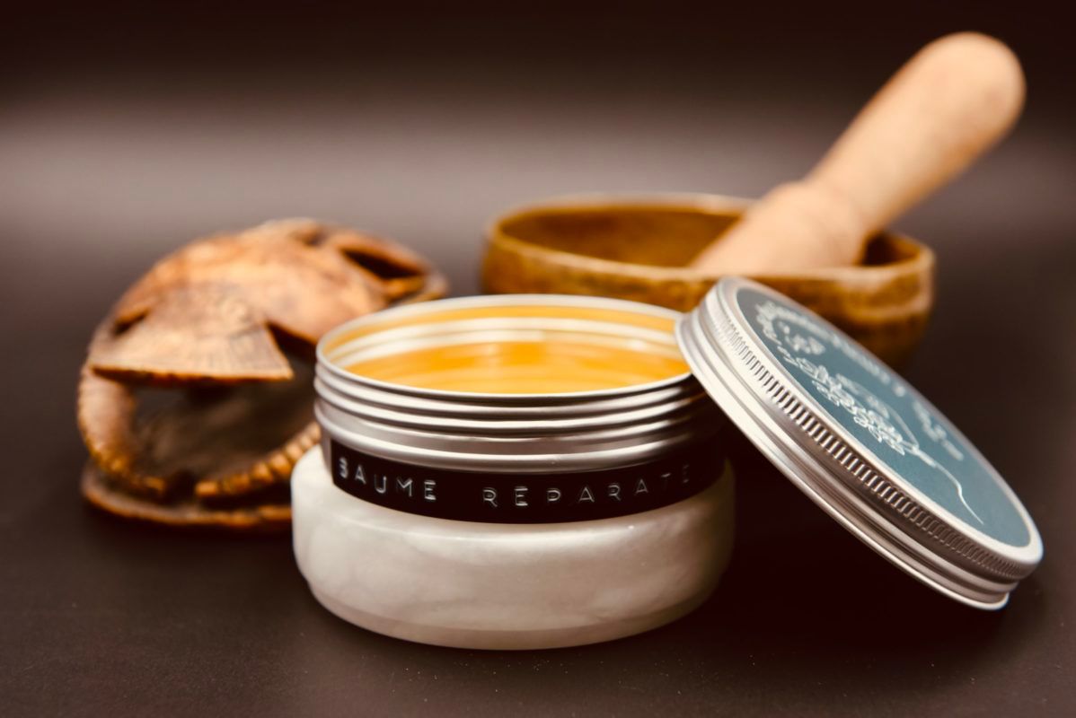 Jar of yellow balm, labeled