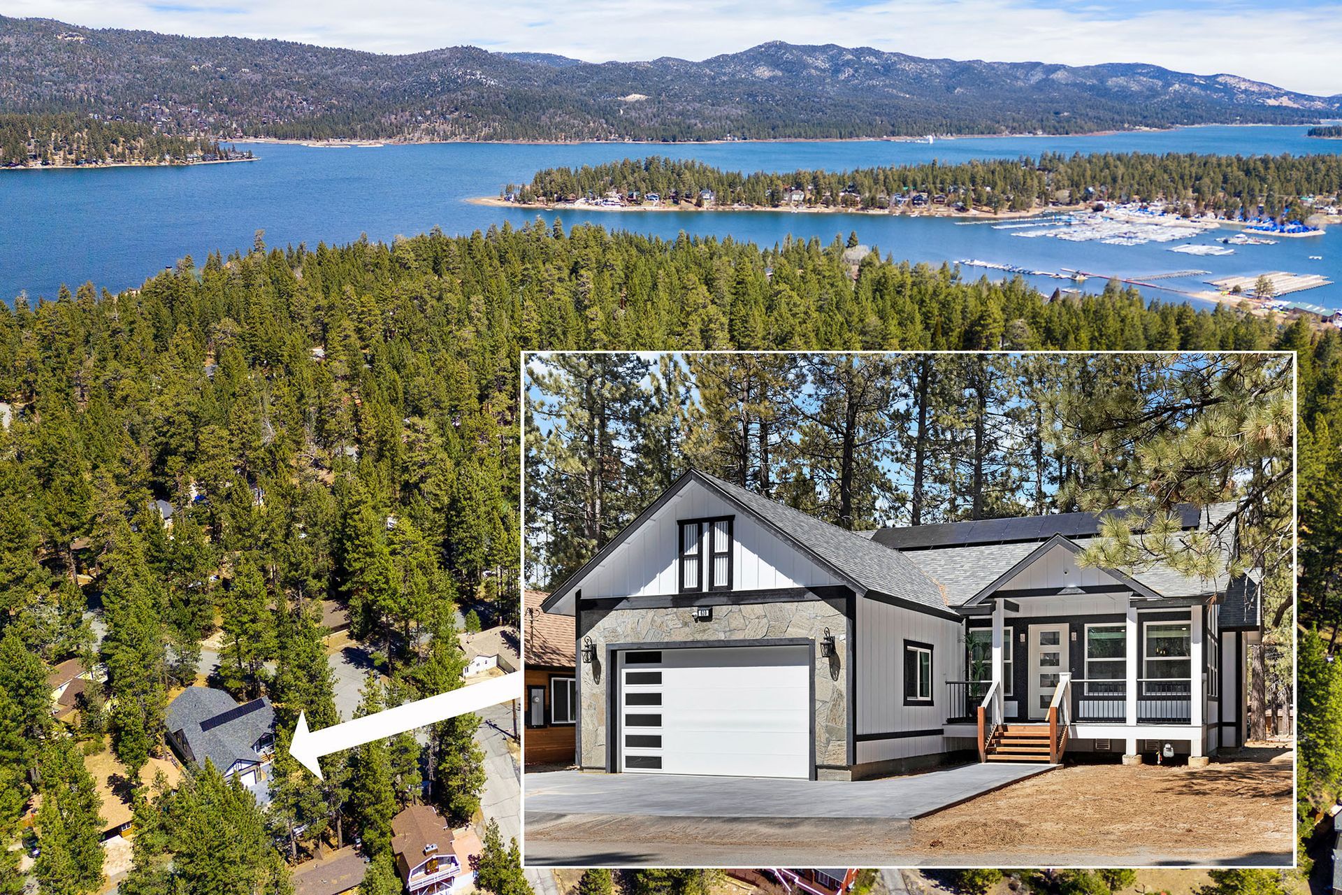 An aerial view of a house with a lake in the background