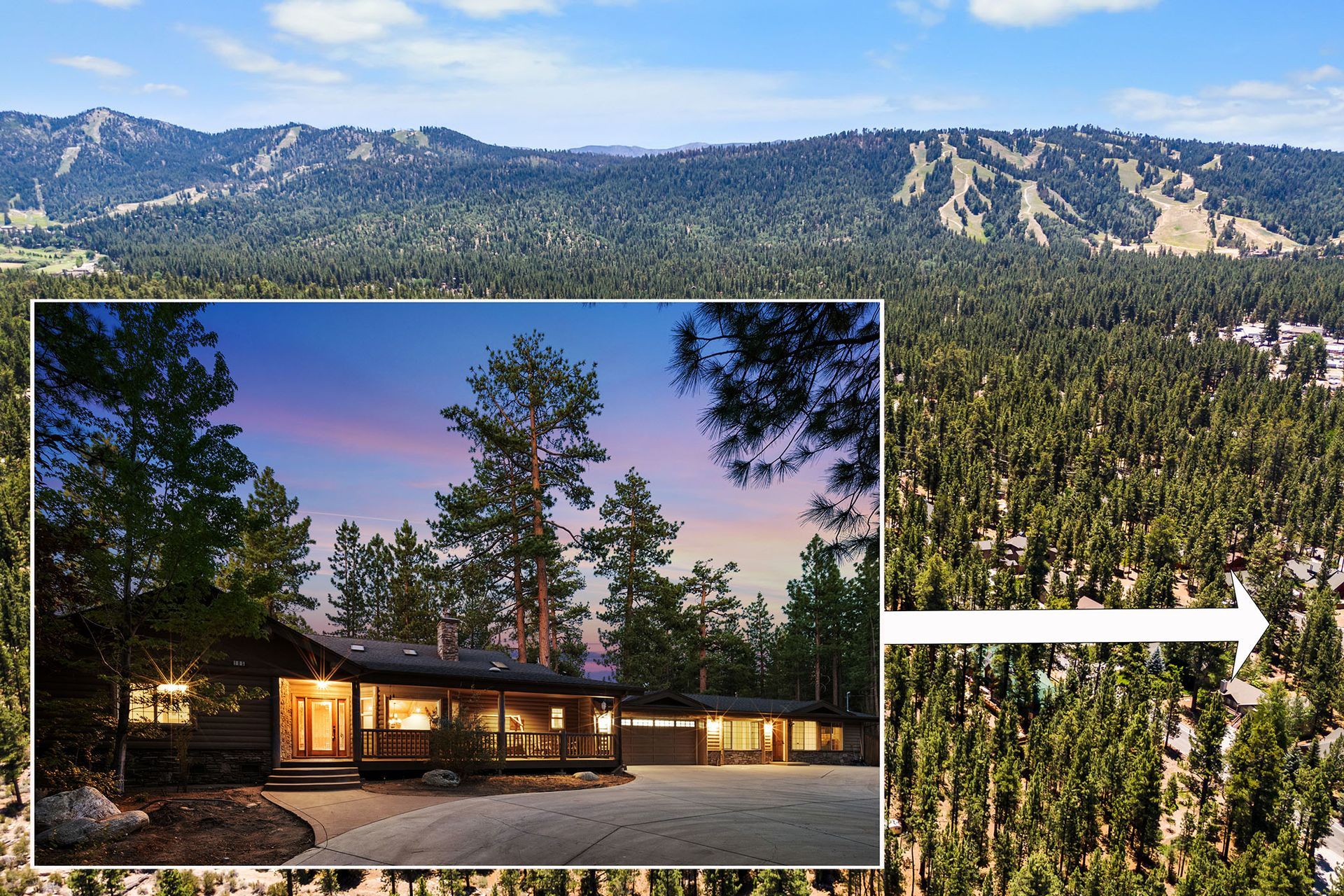 A house in the middle of a forest with mountains in the background
