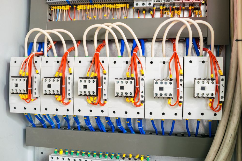 A Close Up Of A Electrical Panel With A Lot Of Wires Coming Out Of It — Keany's Electrical Service In North Nowra, NSW