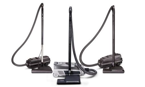 Three gray vacuum cleaners arranged in a row against a plain white background.