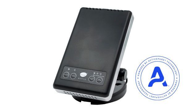 A black, rectangular air purification device on a stand, with a control panel and an