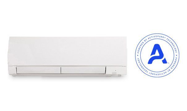 A white wall-mounted air conditioner unit next to a blue 