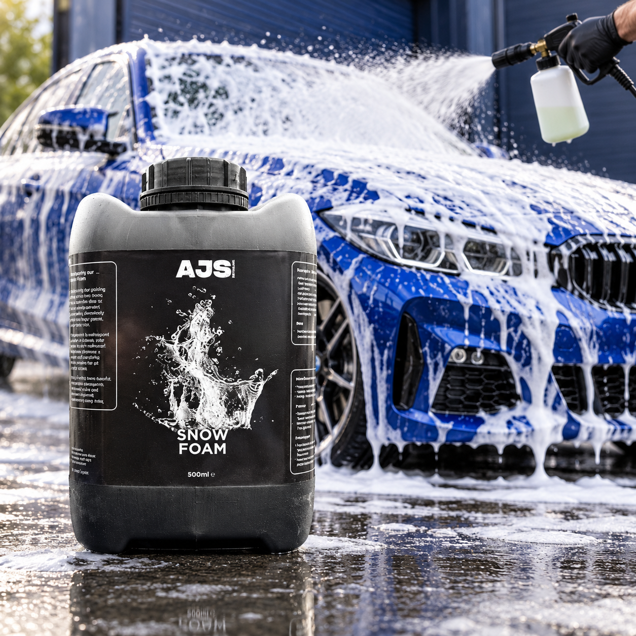 AJS Ultra Snow Foam bottle beside a vehicle covered in foam