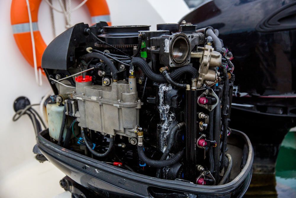 A Close Up Of An Outboard Motor On A Boat — Reef 2 River Marine in Proserpine, QLD