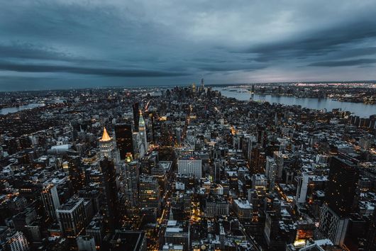 grey concrete buildings under cloudy sky