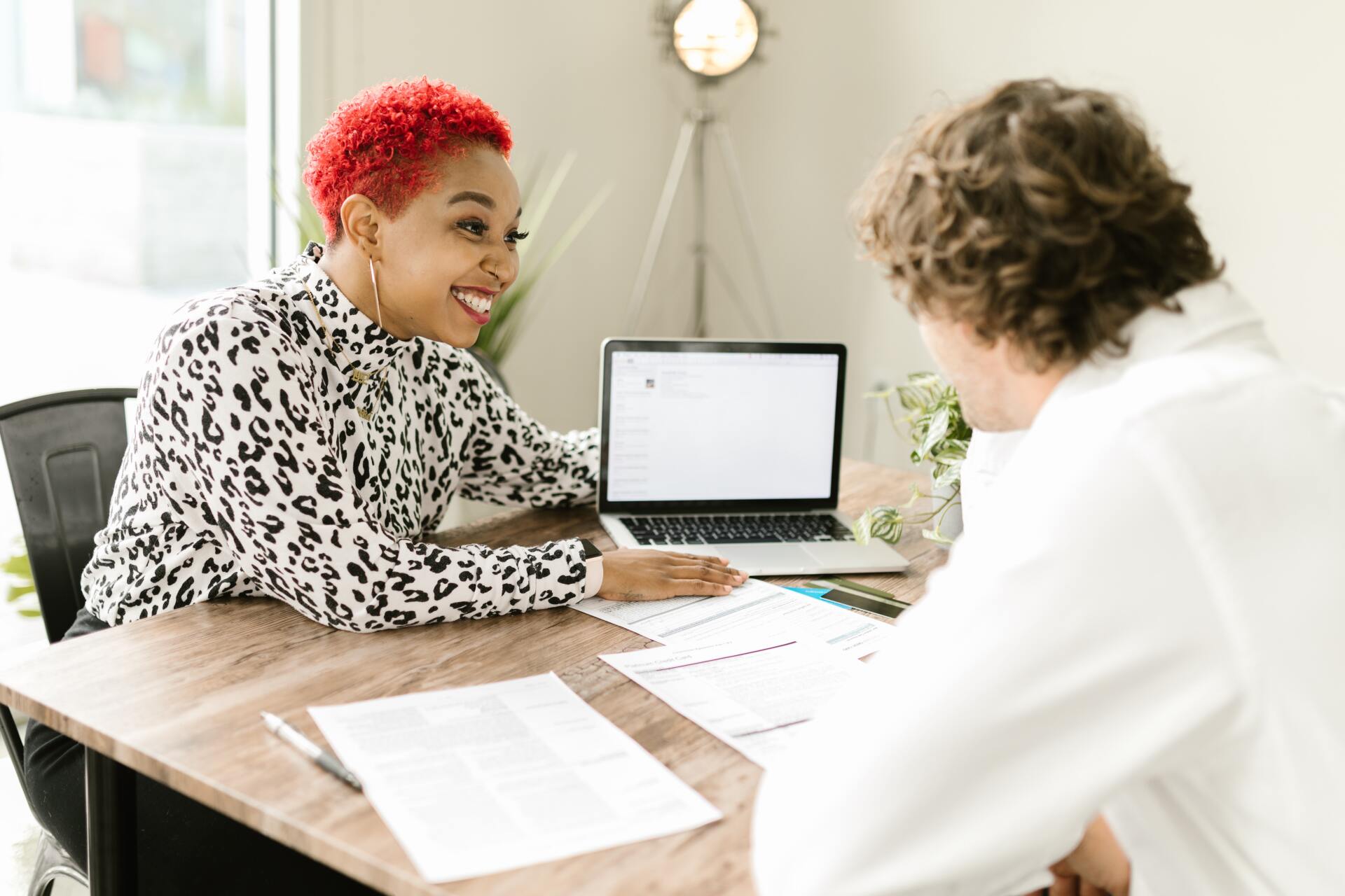 An agent conducting an orientation with the client