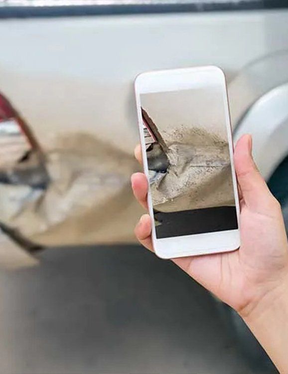 taking picture near a damage car