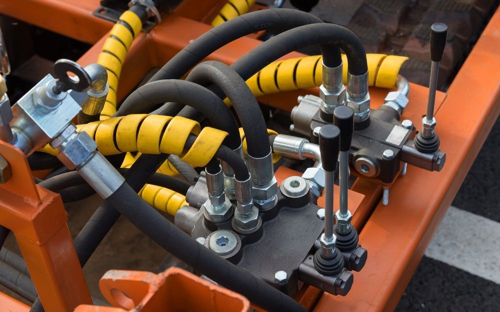 A Bunch Of Hydraulic Hoses Are Connected To A Machine — Hosemobile In Way Way, NSW