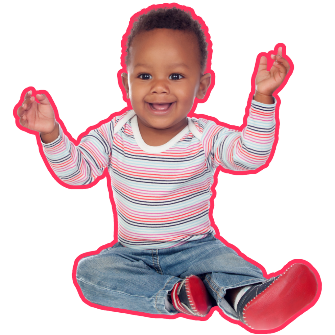 A baby is sitting on the floor with his hands in the air.