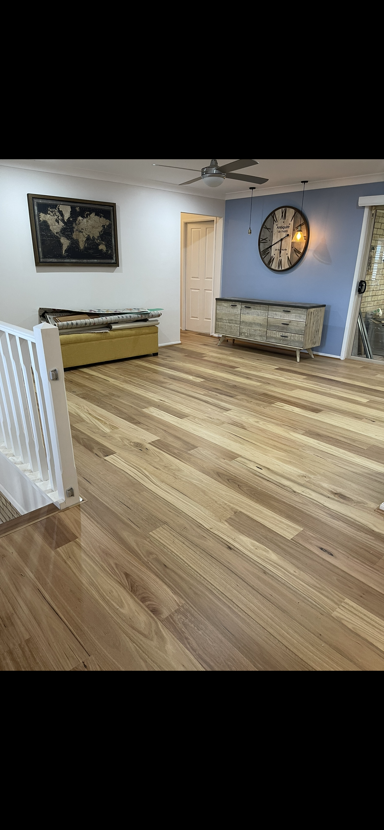 Wood floor with sofa chair and cabinet
