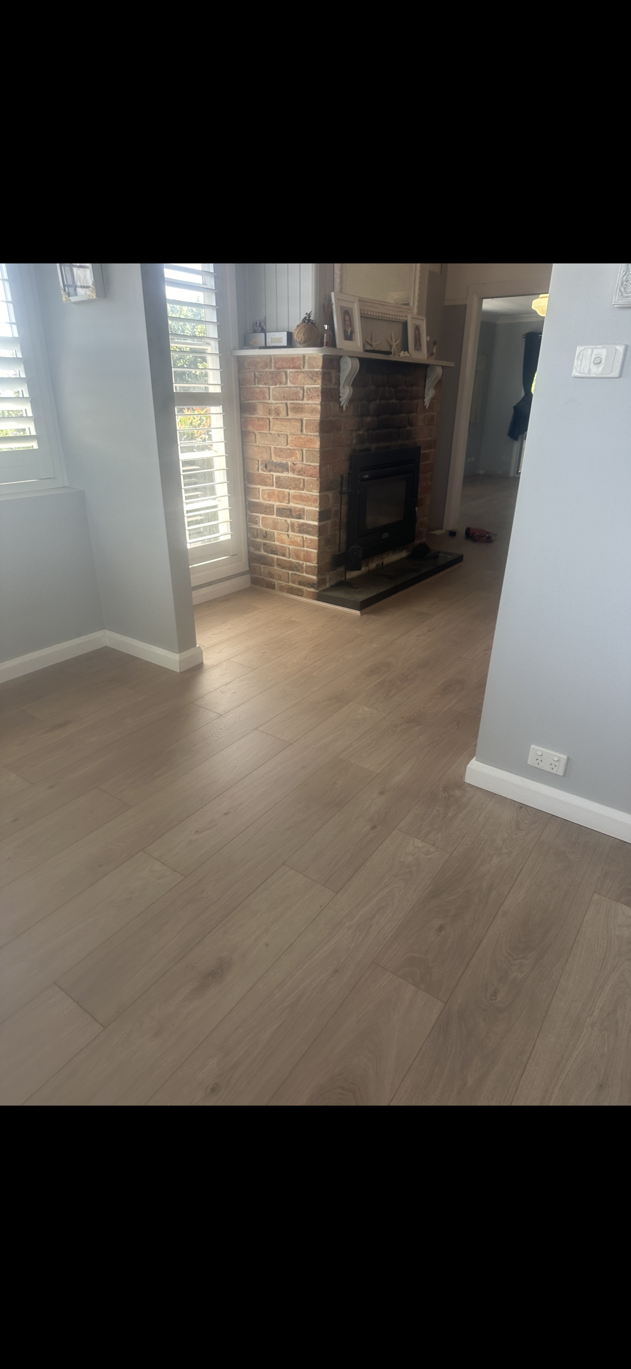 There is a fireplace in the middle of the room.