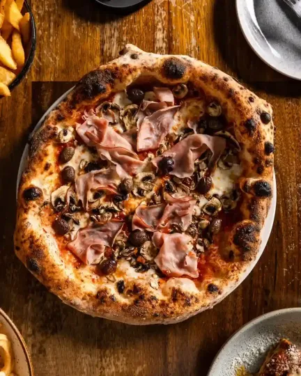 Capricciosa Pizza at Il Caminetto