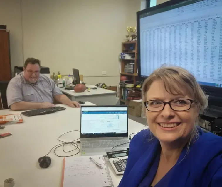 Client and Lady Working On Accounting — Adding Value CFO Pty Ltd in Larrakeyah, NT