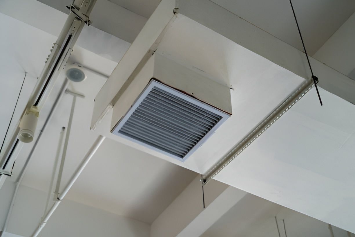 Ceiling-mounted Air Vent And Fluorescent Light Fixtures — Enterprise Air That's Cool In Svensson Heights, QLD