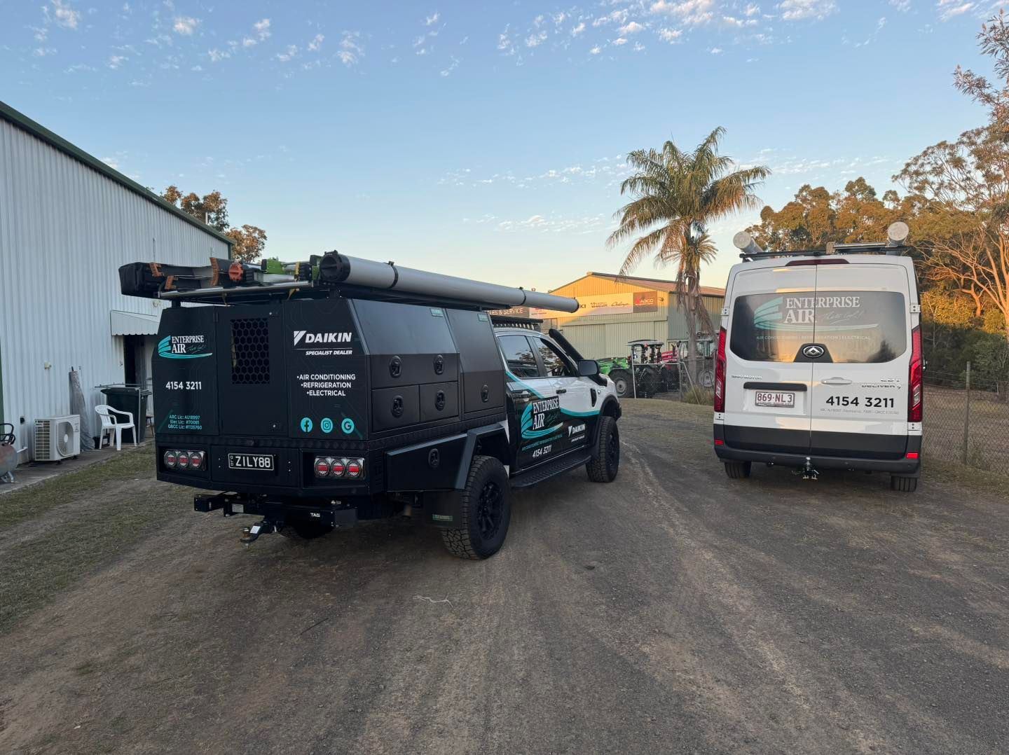 Black Service Truck Beside a White Van — Enterprise Air That's Cool In Svensson Heights, QLD