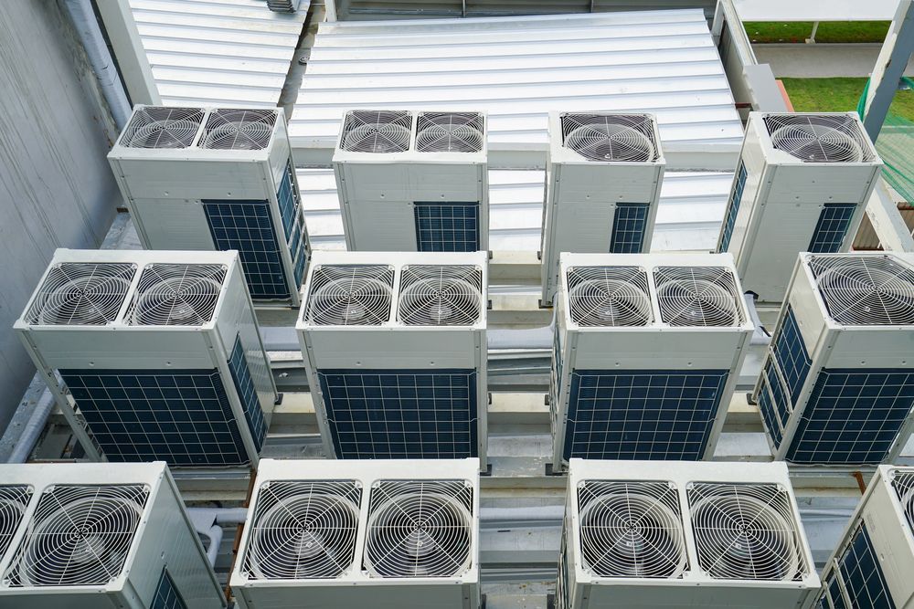 Rows of Outdoor Air Conditioning Units — Enterprise Air That's Cool In Avondale, QLD