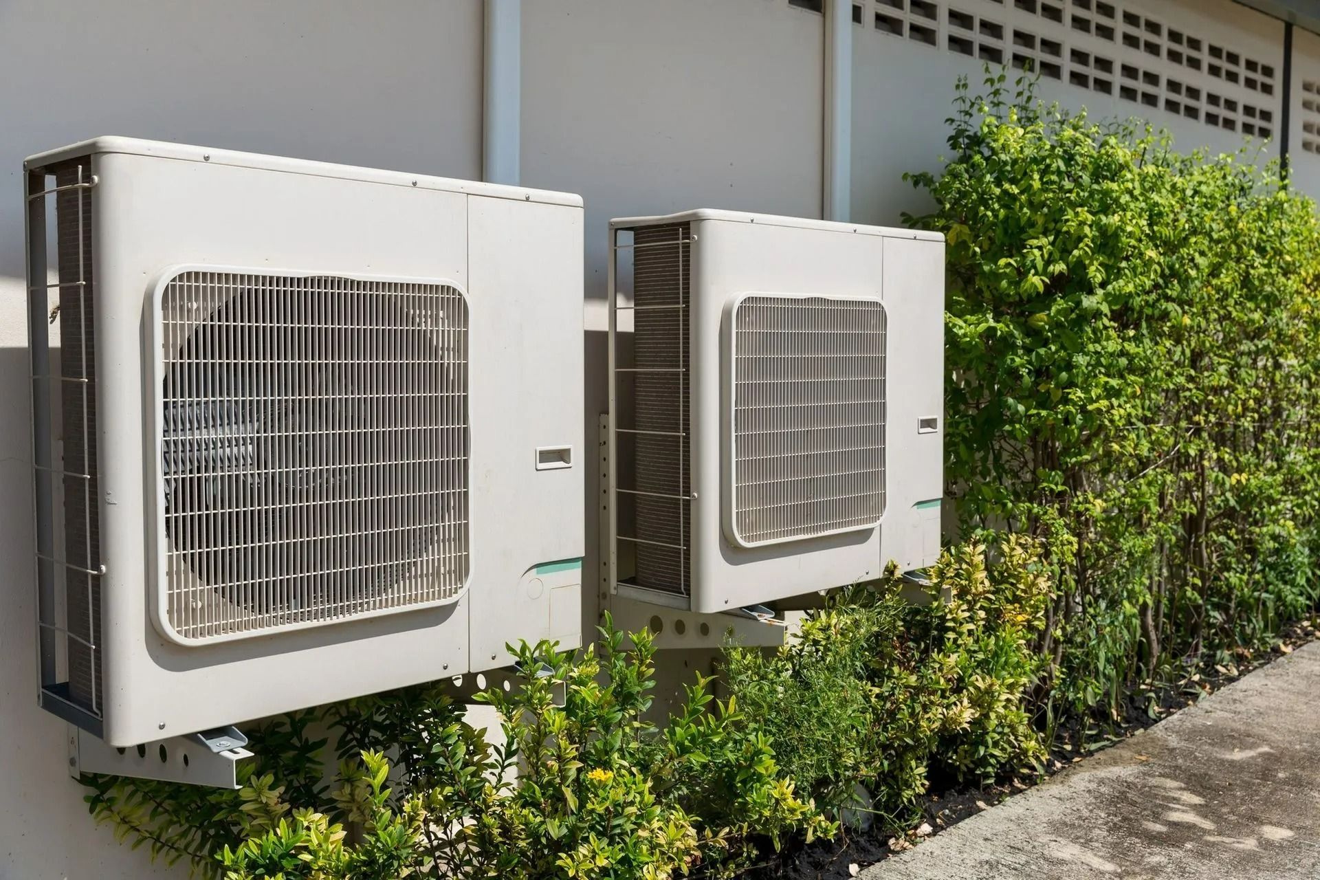Two Outdoor Air Conditioning Units Mounted — Enterprise Air That's Cool In Svensson Heights, QLD